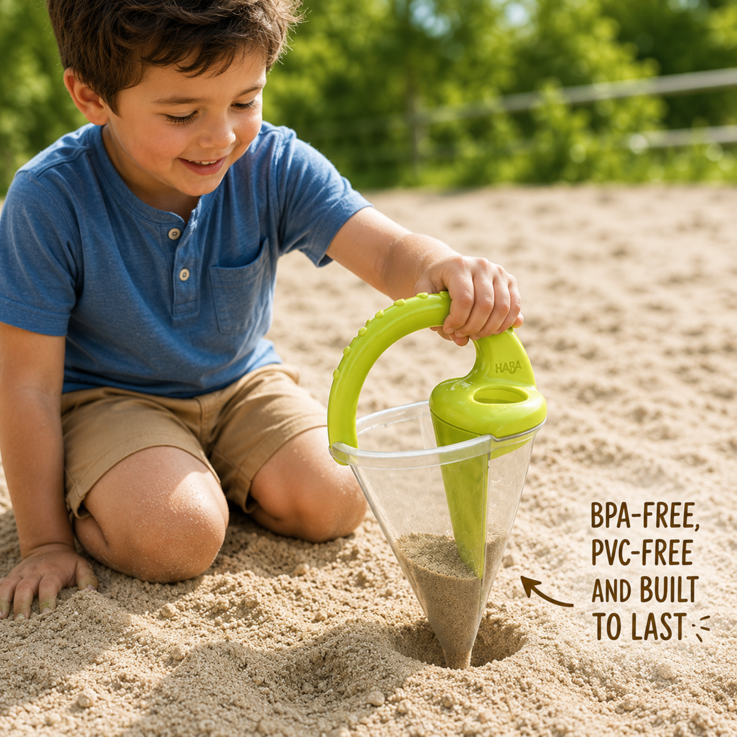 Child playing with SandSwirlโข beach toy creating sand castles with sand and water play